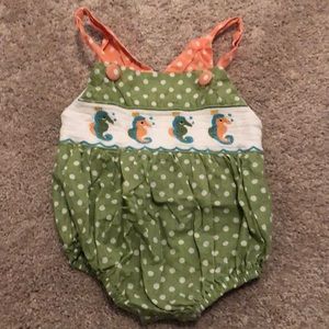 Smocked seahorse bubble.